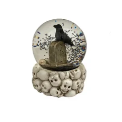 BOULE À NEIGE OISEAUX TÊTE MORT 7X9CM