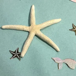 100 CONFETTIS ÉTOILE DE MER SIRÈNE 2-3.5CM PASTEL